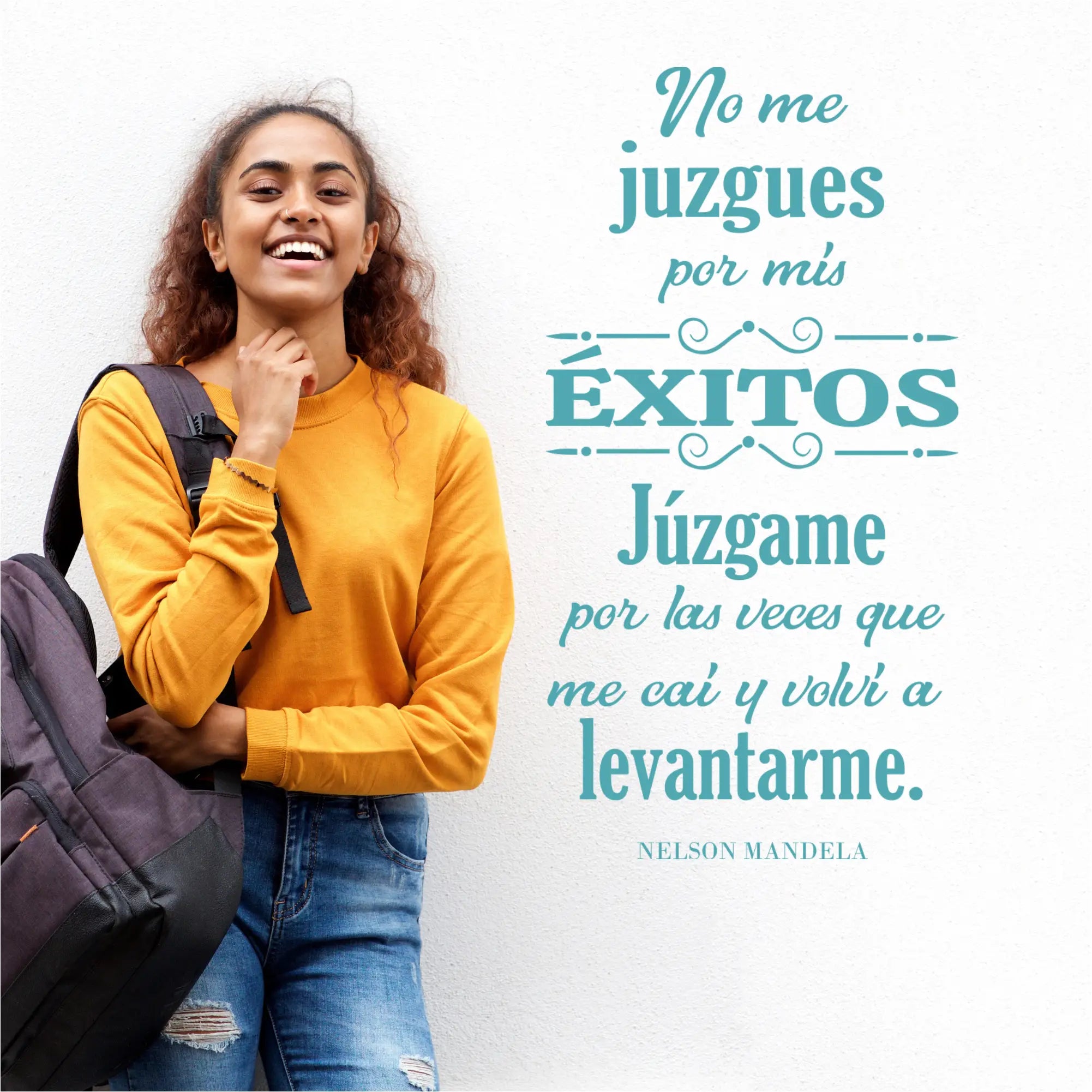 Yellow long-sleeved sweater displayed with nelson mandela wall decal featuring a success quote in spanish translation