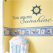 You Are My Sunshine - Cute vinyl wall decal on a boy's room wall with a large sun graphic decal by The Simple Stencil