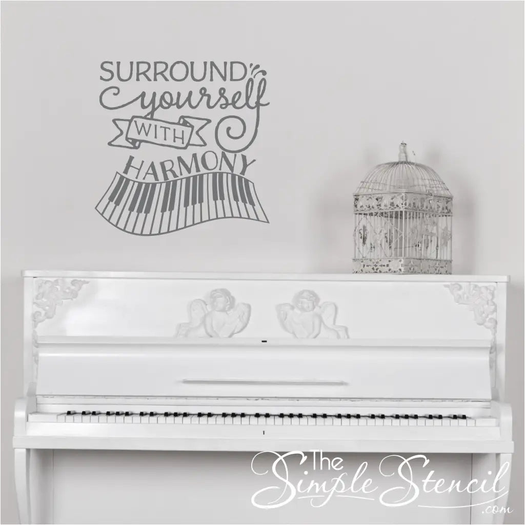 A stylish "Surround Yourself with Harmony" vinyl decal with a keyboard graphic decorates a music teacher's office wall, promoting a positive and inspiring space for both teachers and students.
