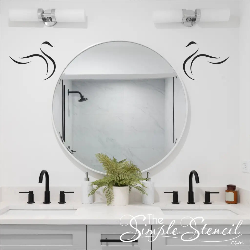 swan wall decals facing each other on bathroom mirror wall by the simple stencil