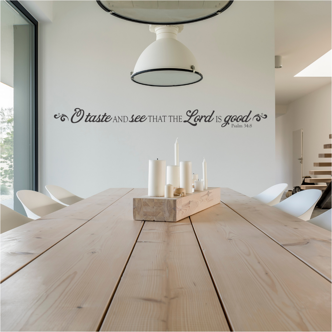O taste and see that the Lord is good. Psalm 34:8 bible verse wall decal art by The Simple Stencil showing on a dining room wall.