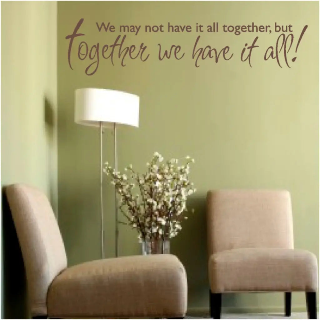 A funny wall quote decal by The Simple Stencil is perfect for family room decor and reads: We may not have it all together, but together we have it all!