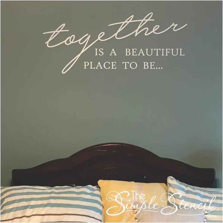 Customer supplied picture - shows this "together is a beautiful place to be" wall decal installed over a master bed in white lettering on gray wall. 