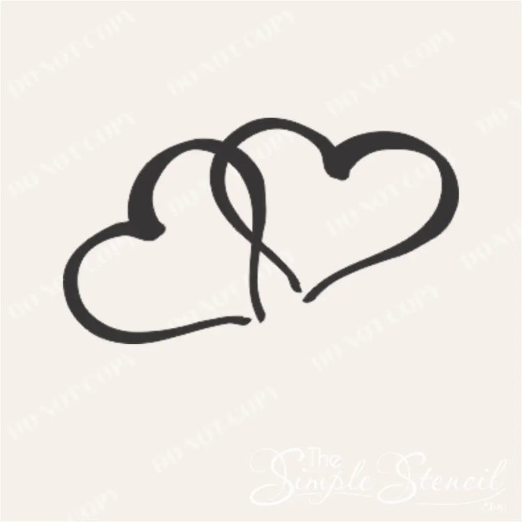 Romantic decal with two interlocking hearts for bedroom