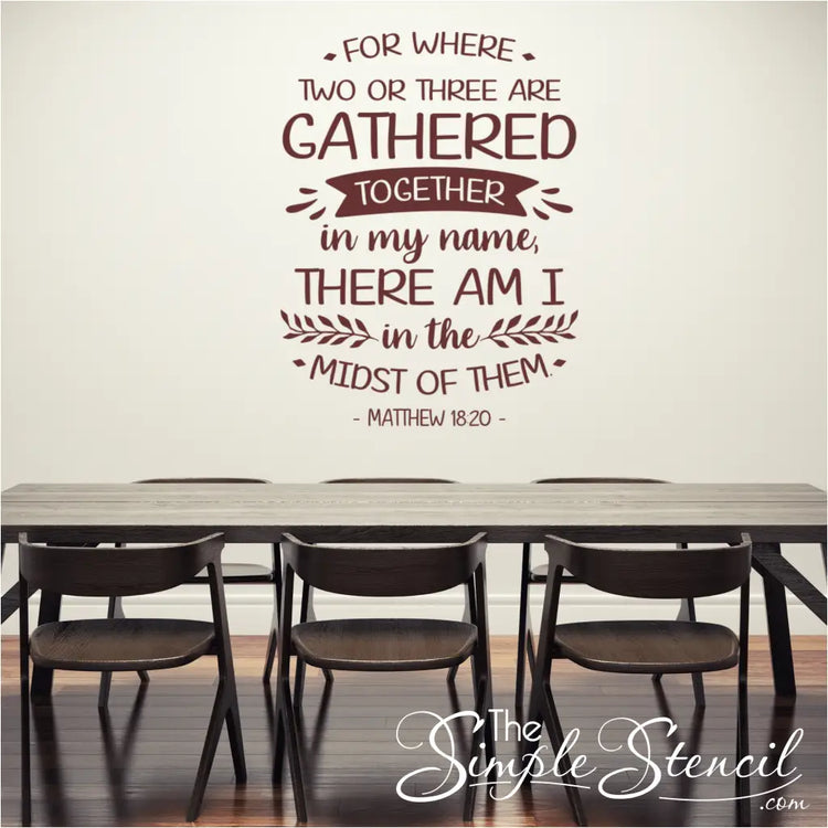 "Where Two or Three Are Gathered" wall decal in burgundy vinyl on a light-colored wall in a church gathering space.