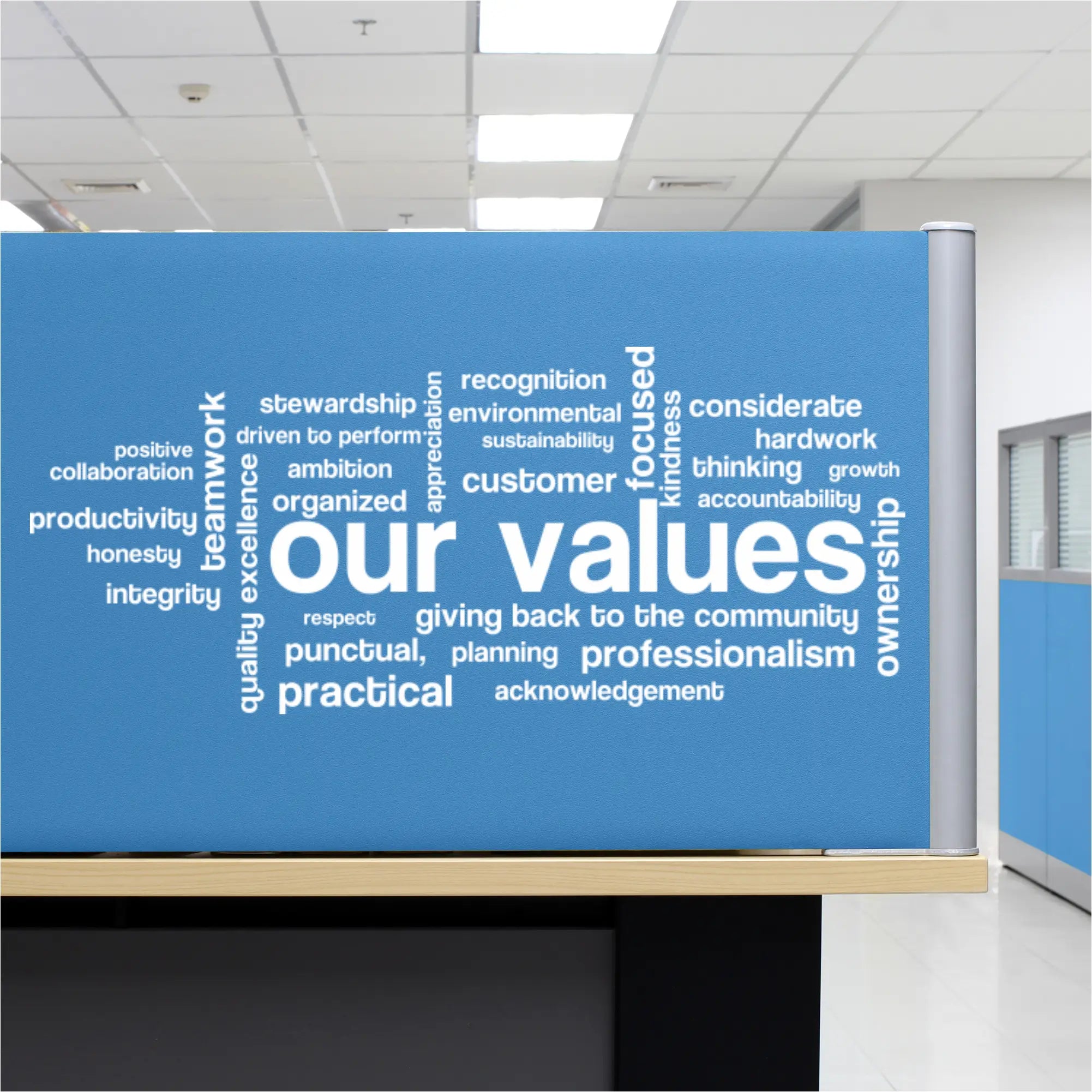 Blue high quality wall decal featuring our values in bold white lettering for office wall and meeting room decor