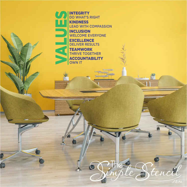 Bright yellow values wall decal with bold green letters listing corporate principles to promote a positive work environment