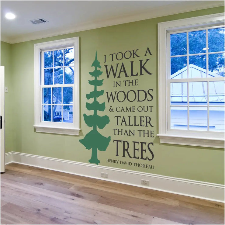 I took a walk in the woods & came out taller than the trees. Henry David Thoreau quote made into a beautiful vinyl wall decal that includes a large tree decal graphic alongside this inspirational quote by Thoreau