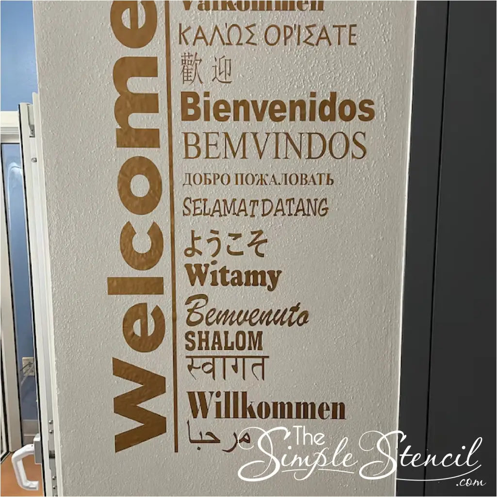 Custom Sized vinyl wall decal of the Welcome in 15 languages wall decal design by The Simple Stencil