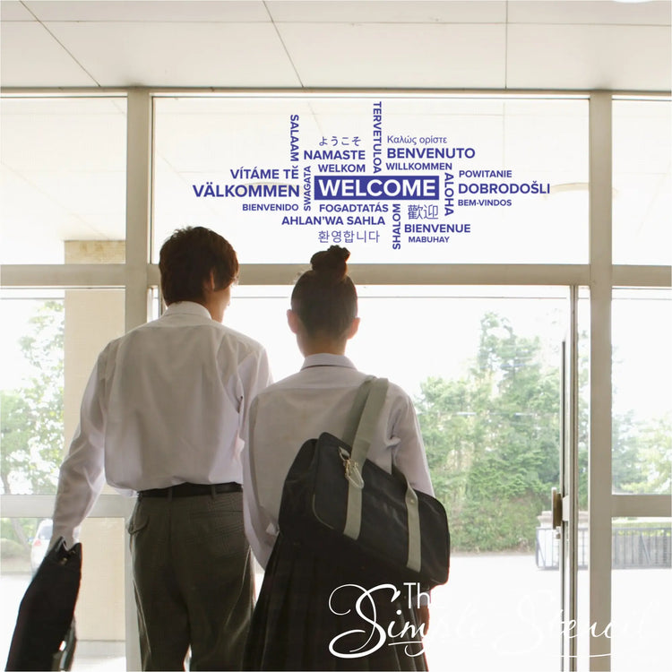 Multilingual welcome wall decal creating an inclusive atmosphere in a community center lobby.