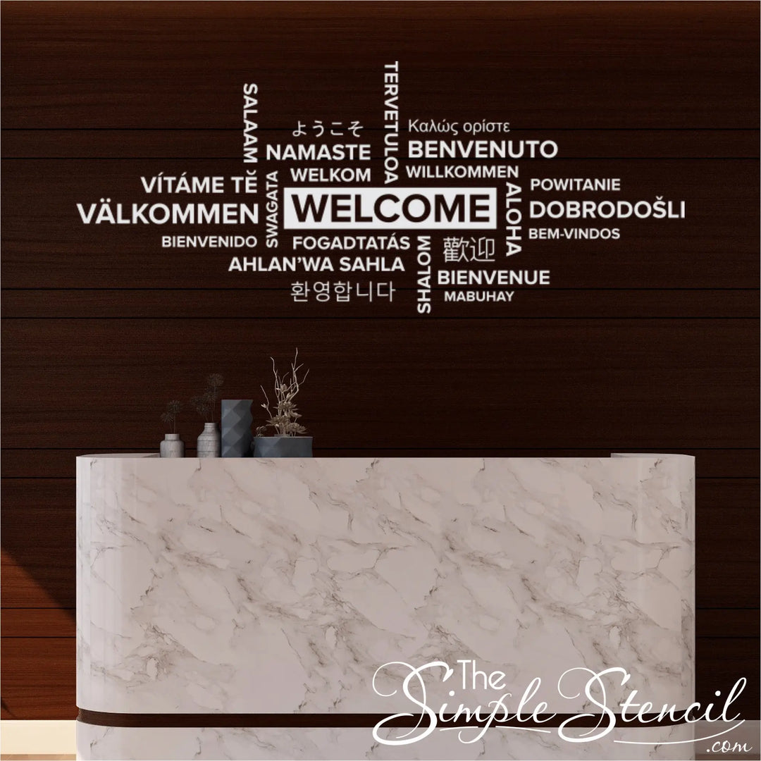 A close-up, high-resolution image showcasing a 'Welcome' wall decal with the word written in a plethora of different languages. This design is intended for a public place like an airport, train station, or public transit with a diverse population.