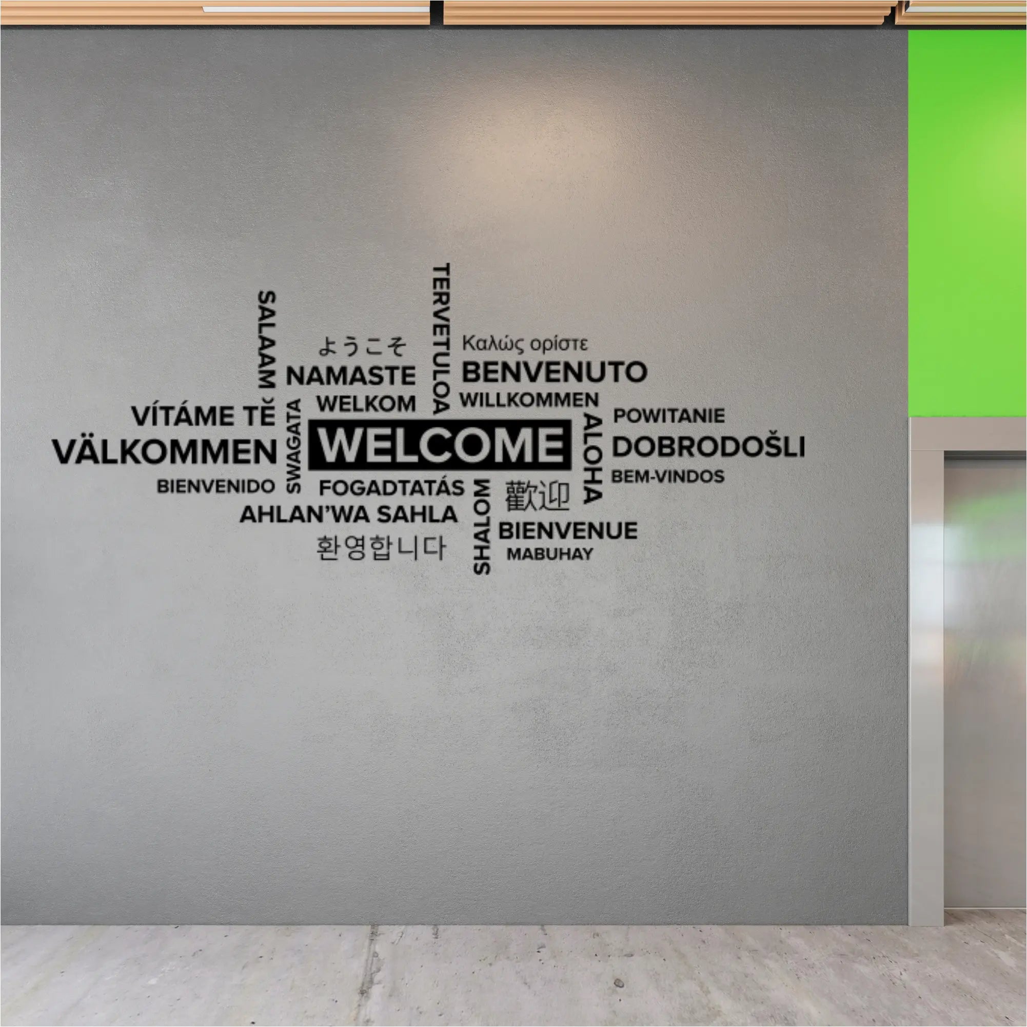 Multilingual welcome wall decal creating an inclusive atmosphere in a community center lobby.