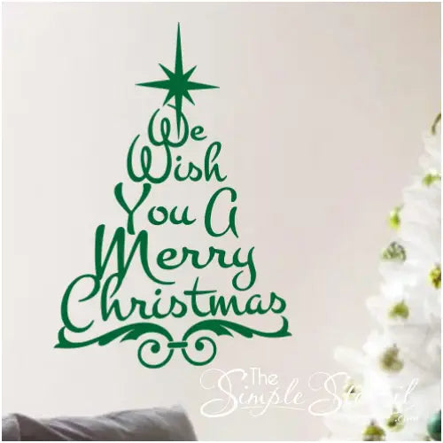 we wish you a merry christmas tree decal art on a living room wall for holiday decor by the simple stencil