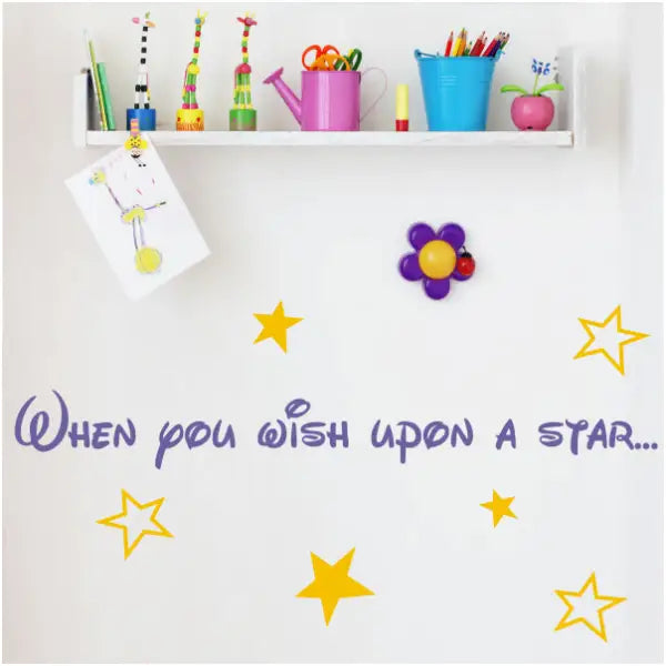 When you wish upon a star wall decal with stars surrounding in a child's room decor. 