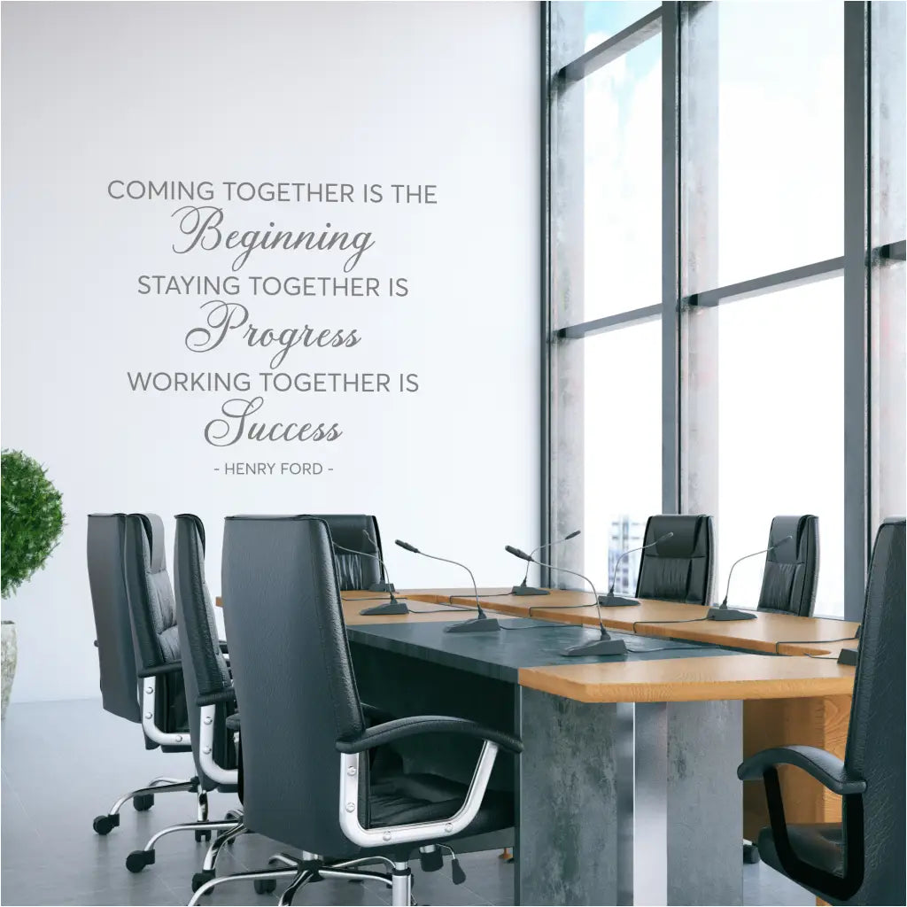 Wall decal with the quote "Coming together is a beginning. Staying together is progress. Working together is success."