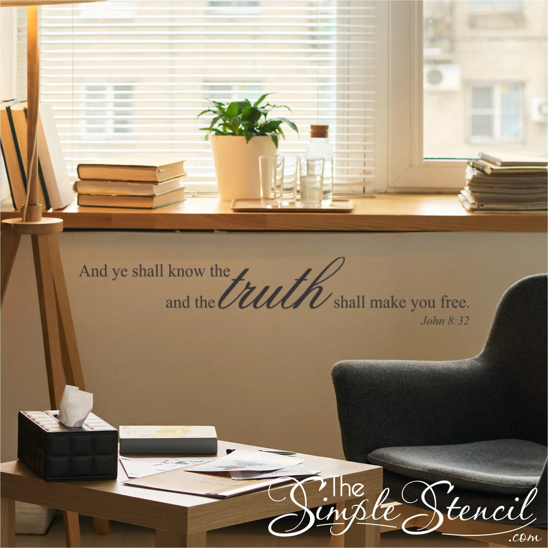 Inspirational Bible verse decal featuring 'The truth shall make you free' styled on a cream wall in a cozy Christian home reading nook next to a window.