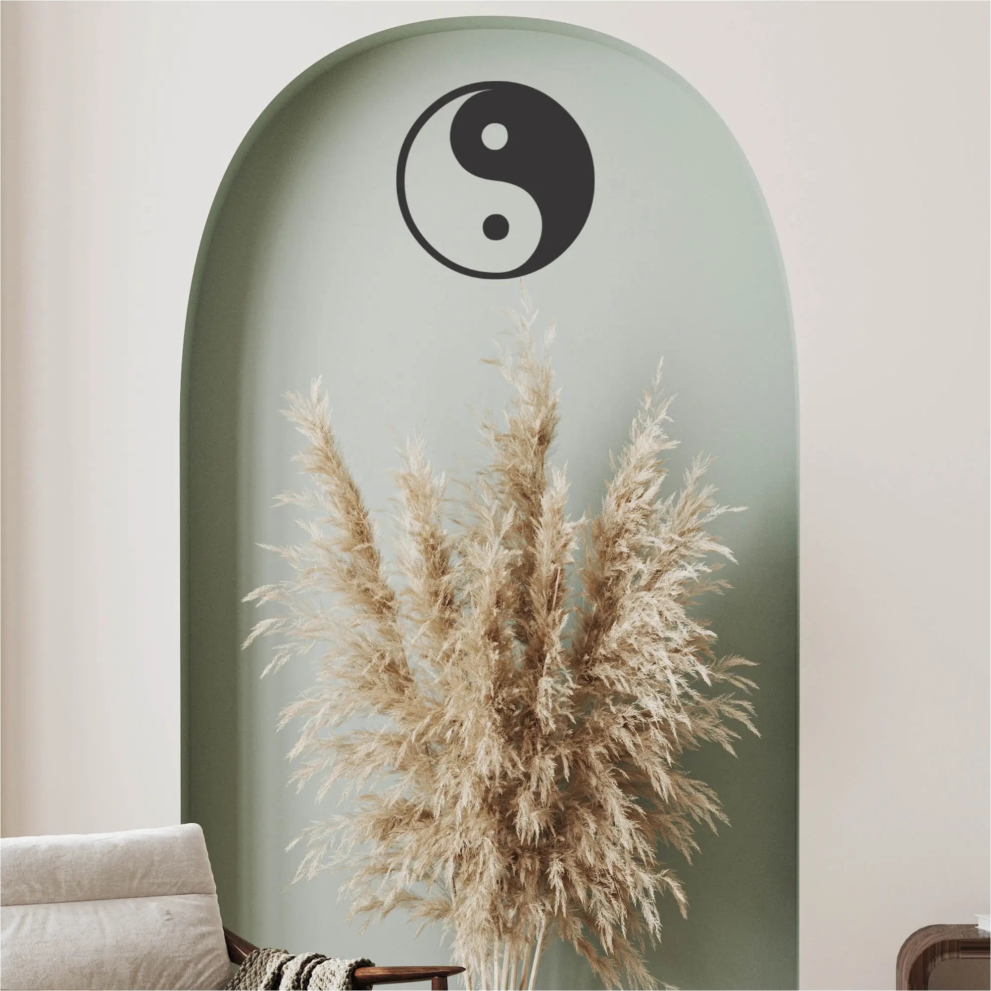 Beautiful home decor with a yin yang decal installed over a pretty arrangement in a sitting area will help remind of balance during contemplative moments. 
