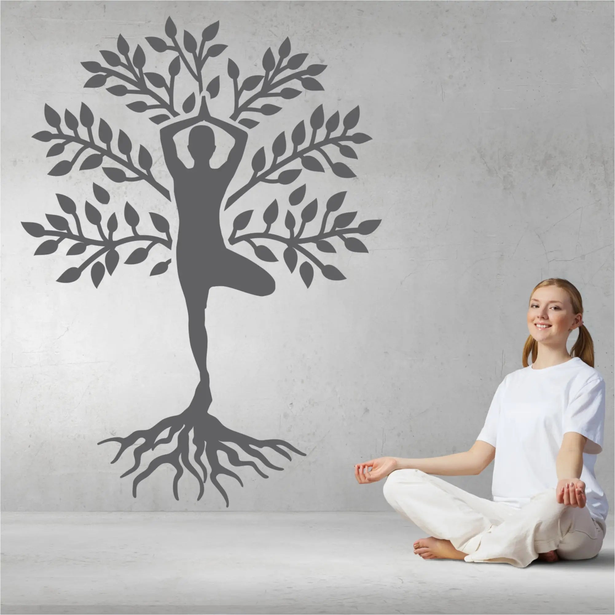 Yoga Tree self adhesive wall decal displayed on a yoga studio wall to create a focal point. Many sizes and colors to choose from!