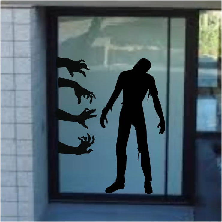 Lurking zombie wall and window decals to decorate and spook your Halloween party guests and trick or treaters. 